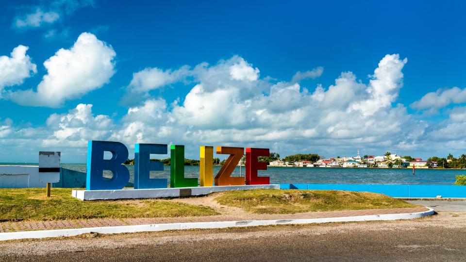 Welcome to Belize Sign at the Caribbean Sea Welcome to Belize Sign at the Caribbean Sea