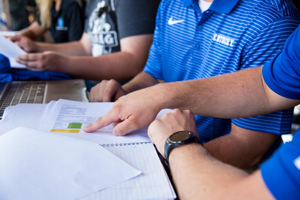 students with notebooks on desk